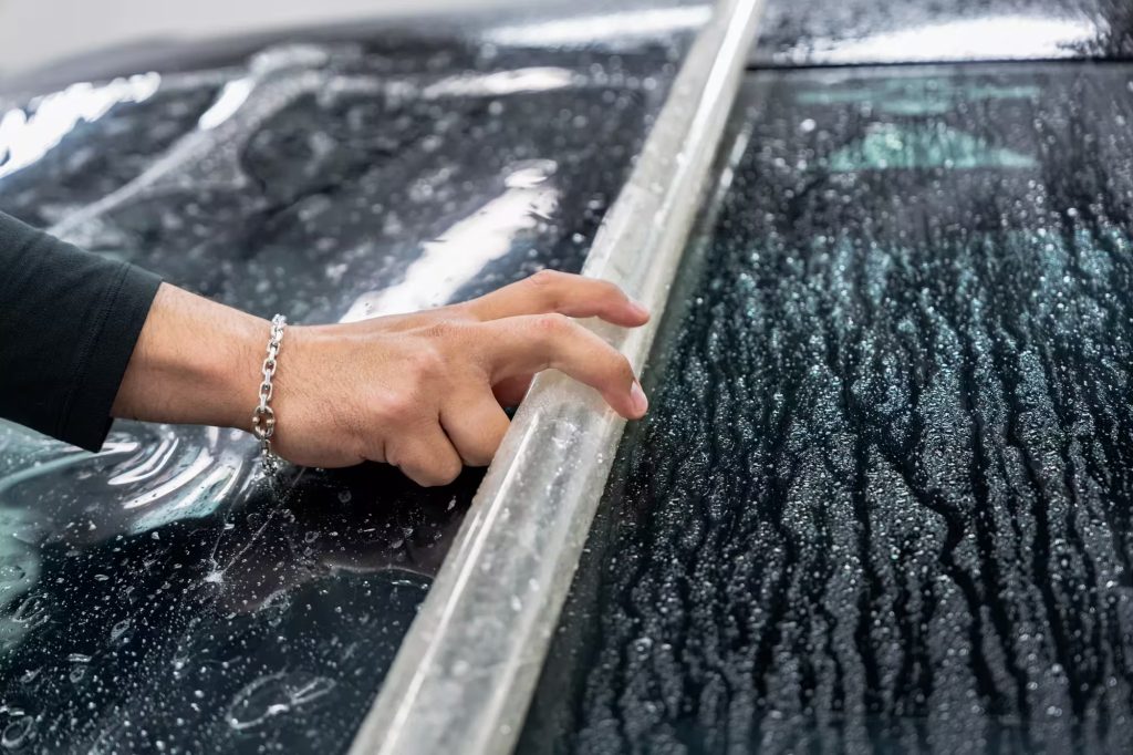 Rock chip damage on car windshield — why Langley drivers need windshield protection film